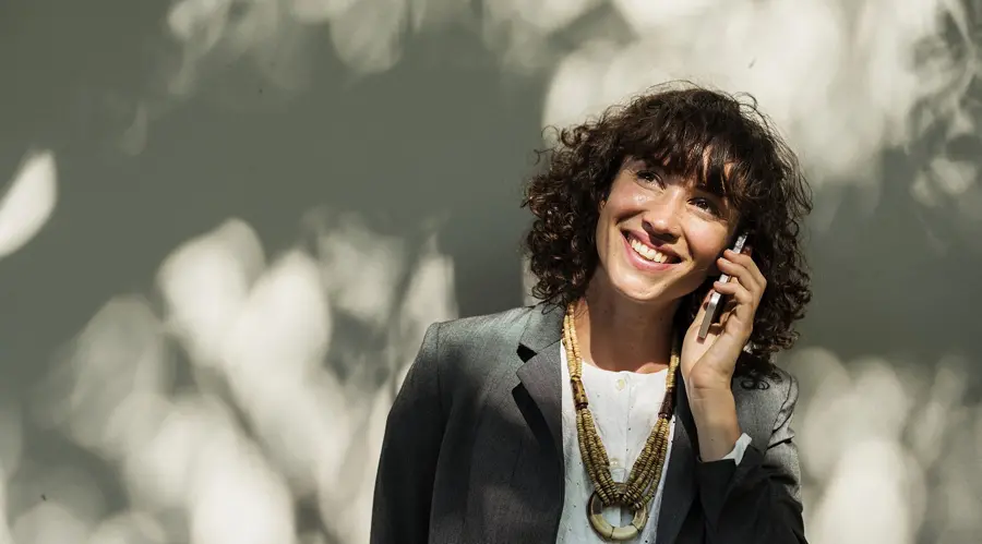 How can I grow my business business woman on phone